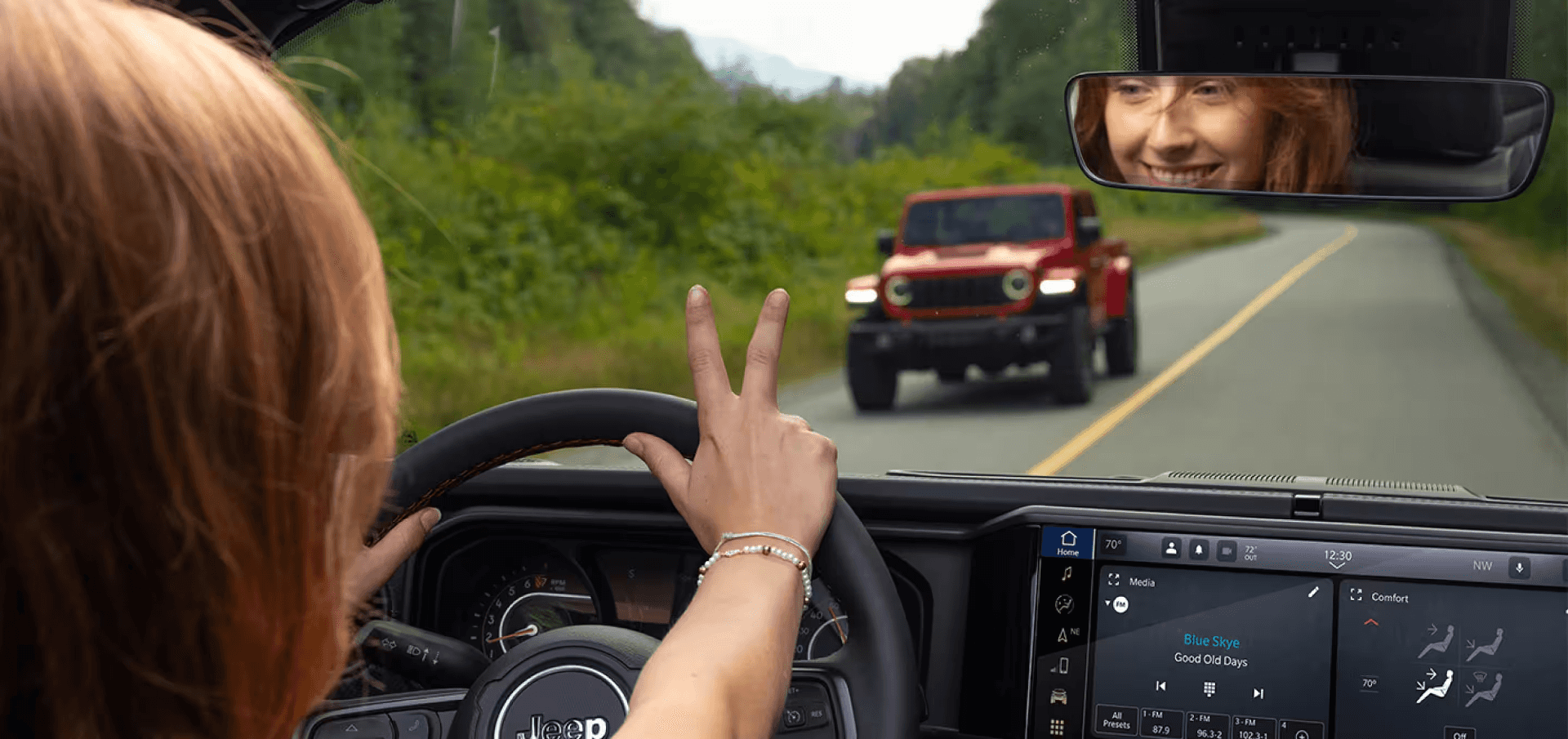Woman driving a Jeep Wrangler