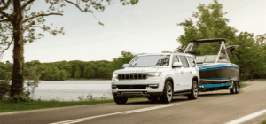 The 2022 Jeep Wagoneer towing a boat near the Fort Pierce area.