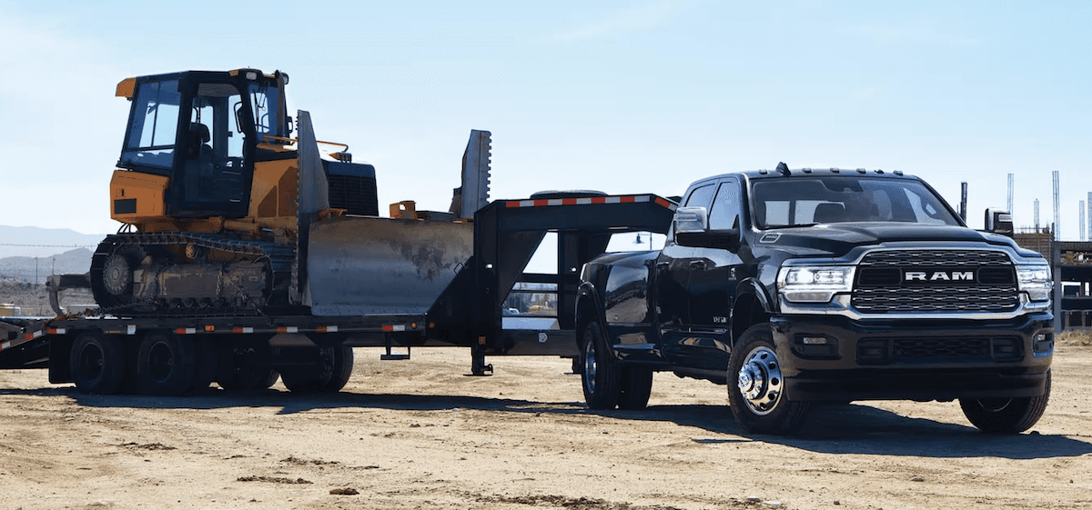 2024 Ram 3500 towing heavy machinery