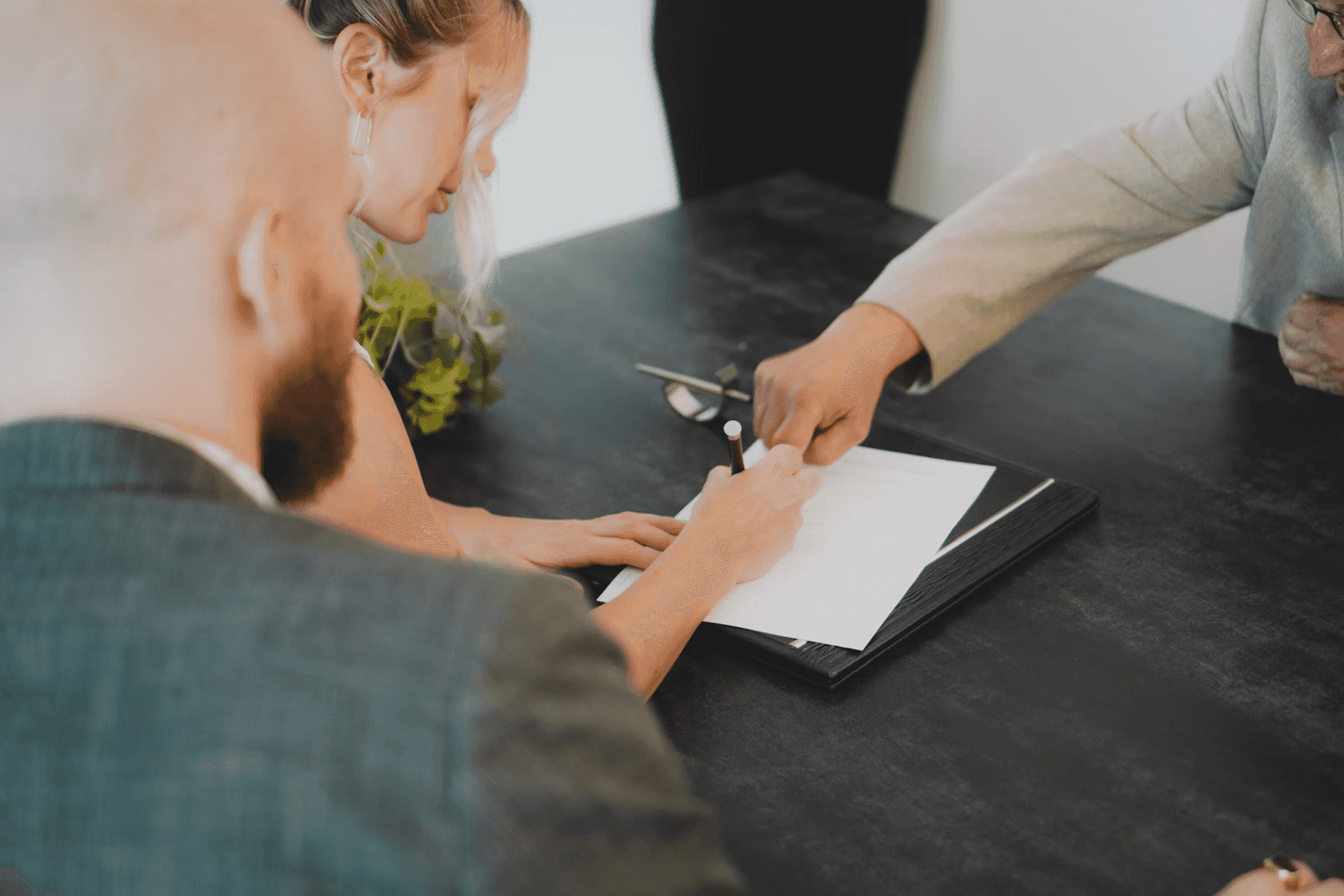 Woman filling out an auto loan
