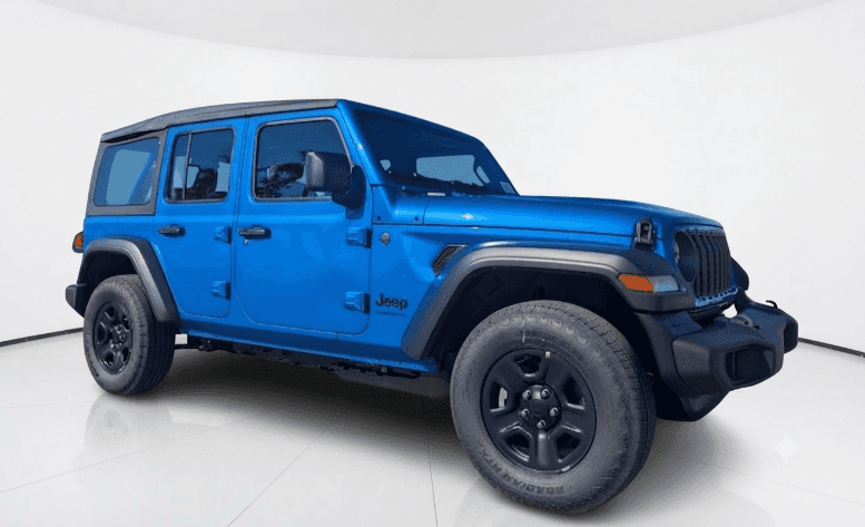 Blue Jeep Wrangler in a studio setting