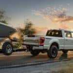 2020 Ford F-250 super duty towing boat on road