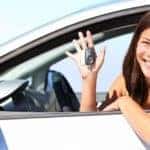 woman holding mazda key fob