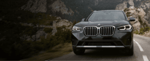 BMW X3 Front View Driving Mountainside