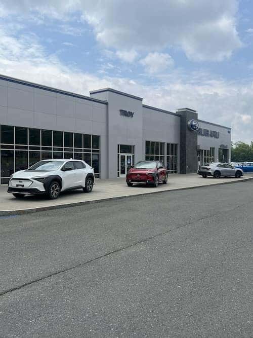 car dealership with 3 vehicles