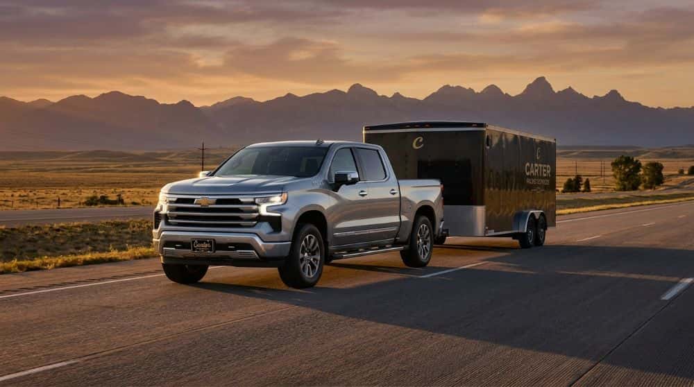 2026 Chevrolet Silverado 1500 towing on a highway, representing diesel range