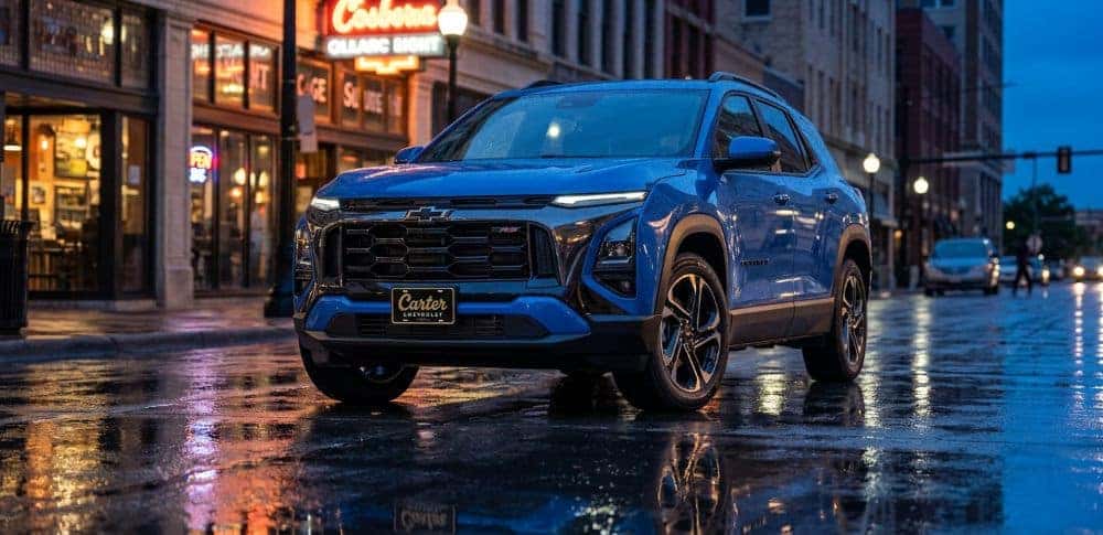 Blacked-out 2027 Chevrolet Equinox RS on a downtown Oklahoma City street at dusk