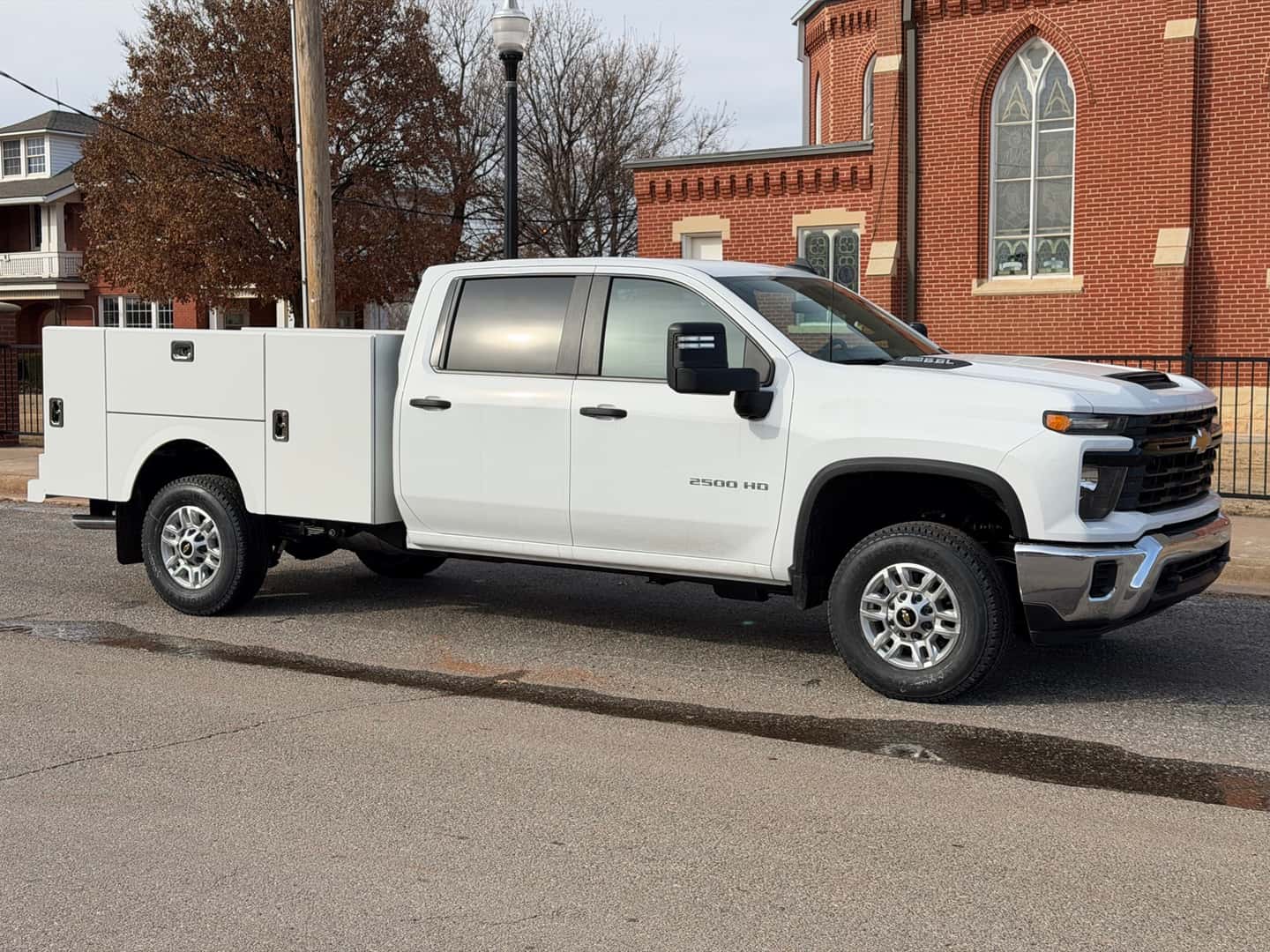 Upfitted Chevrolet Silverado with a service body work truck at Carter Chevrolet in Okarche, OK near Oklahoma City