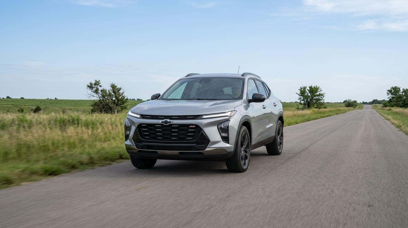 Chevrolet Trax driving toward camera on a rural two-lane road