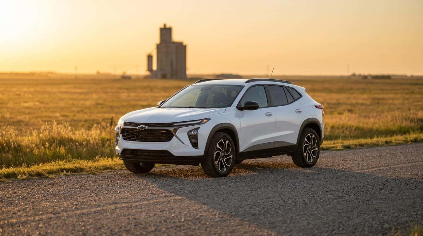 Chevrolet Trax parked on a rural road with a grain elevator silhouette near Yukon, Oklahoma