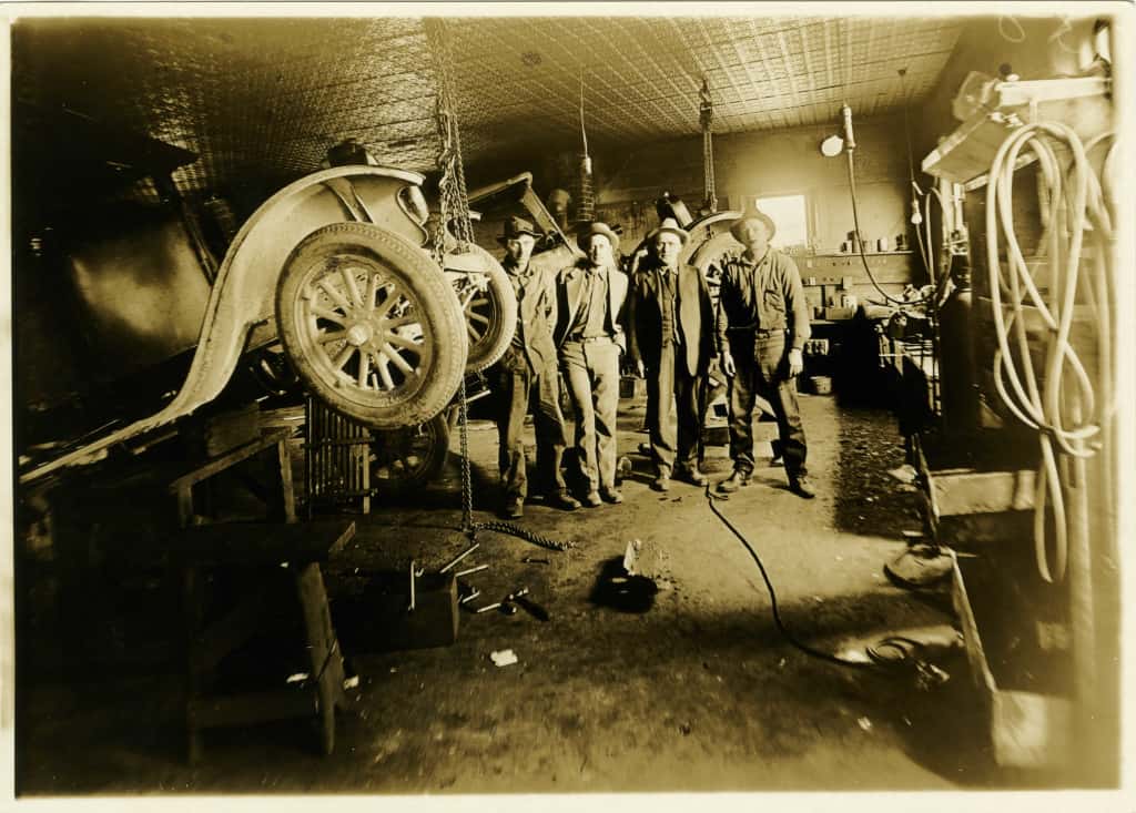 Inside of Shop Area 1928 L to R - Don't know, Oliver Johnson, Joye Johnson, Henry (Hank) Kruger