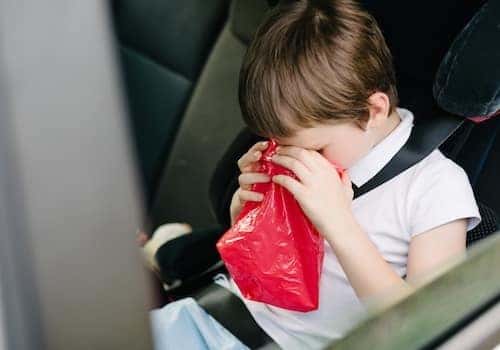 Child vomiting in car