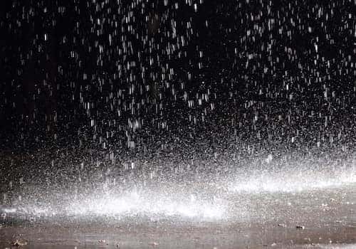 Rain falling on car