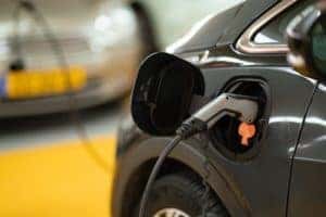 Electric car plugged in and charging.