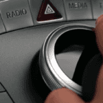 Closeup of hand on Mercedes-Benz COMAND controller