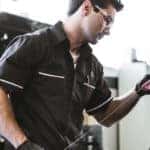 Technician performing Mercedes-Benz Service A on vehicle