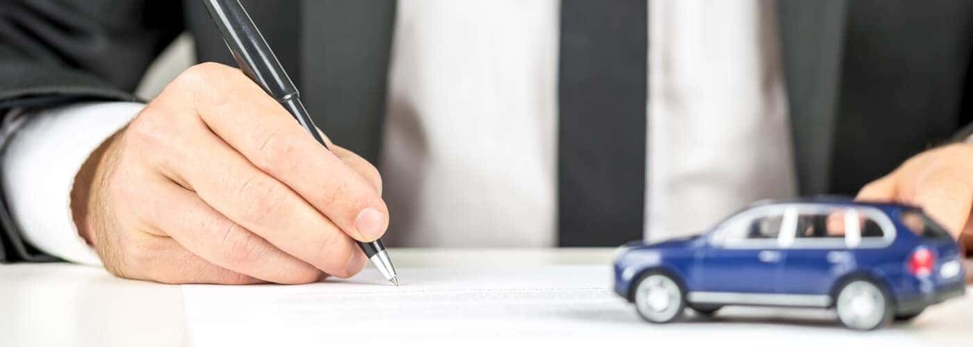 Signing Documents for Car