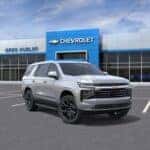 2025 Chevy Tahoe parked in front of Greg Hubler Chevrolet dealership in Camby IN