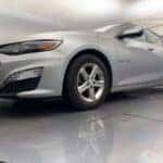 Chevrolet Malibu silver exterior view highlighting front design and wheels Camby IN