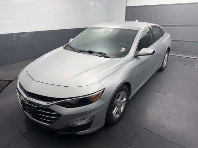 Chevy Malibu silver sedan front three quarter view at Greg Hubler Chevrolet Camby IN