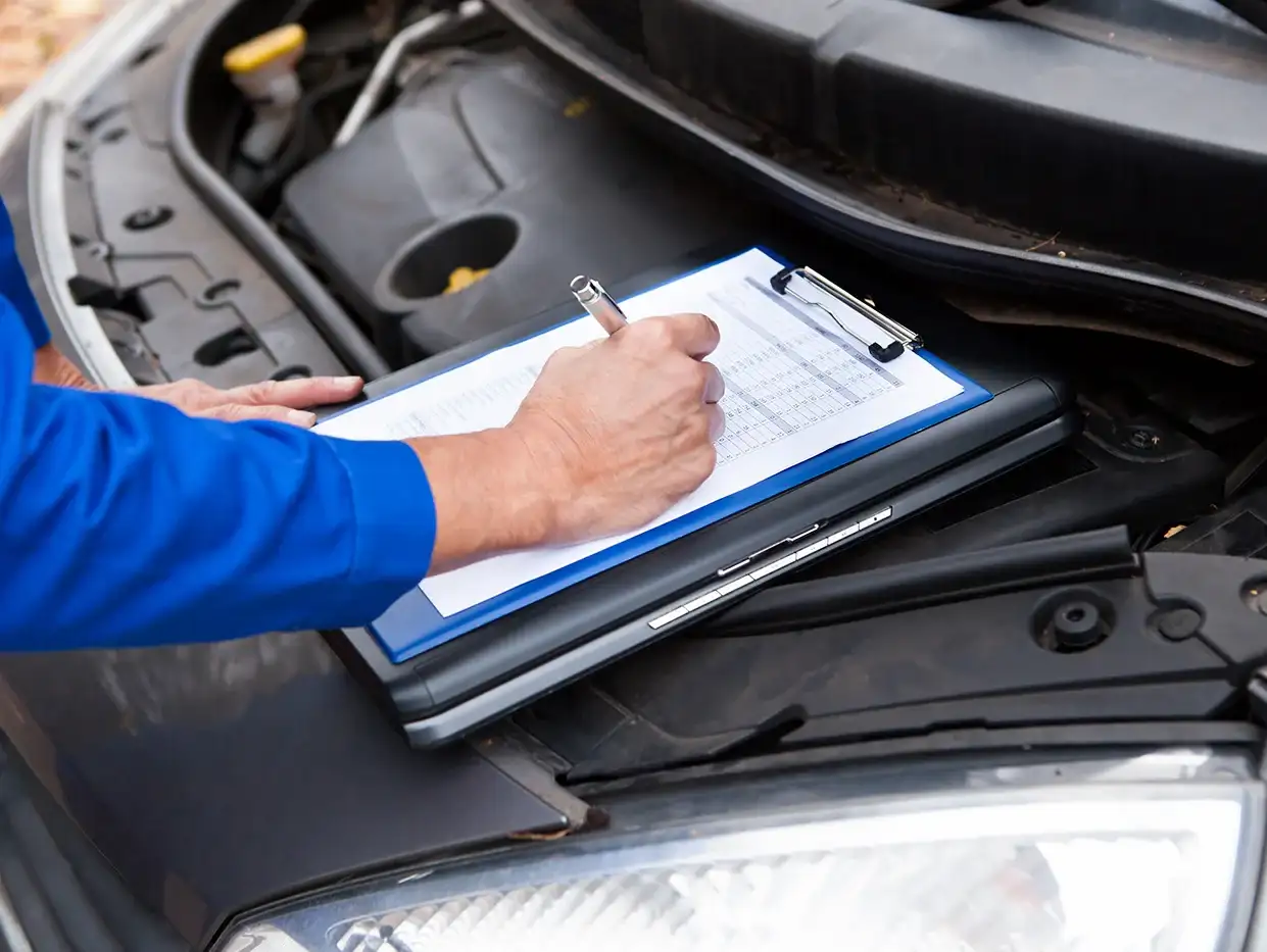Chevy Certified Technician Inspecting a Trailblazer