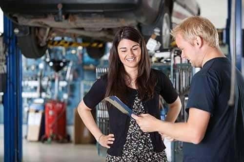 Mechanic Talking to Woman