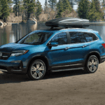 2019 Pilot parked by the water