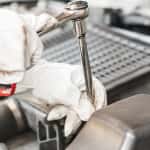 Service technician working on a vehicle