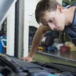 Mechanic checking car