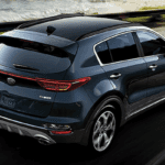 2020 Kia Sportage on a coastal highway