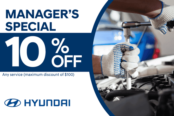 Hyundai service offer featuring 10% off any service, up to a maximum discount of $100. Graphic includes a technician working under the hood of a vehicle.