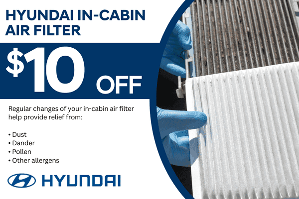 Hyundai service coupon offering $10 off an in-cabin air filter replacement. Graphic features a clean air filter being installed next to a used filter.