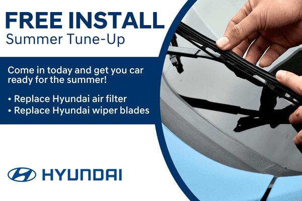 Hyundai summer maintenance offer featuring free installation with the purchase of a Hyundai air filter and Hyundai wiper blades. Graphic shows a technician replacing a windshield wiper blade.