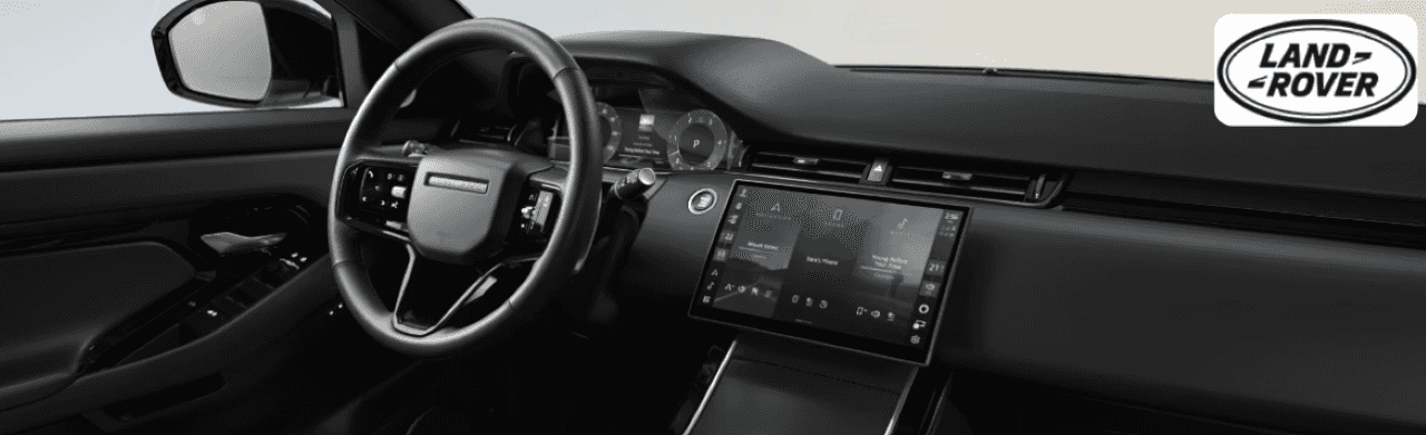Interior view of a Range Rover highlighting luxury details and advanced technology.