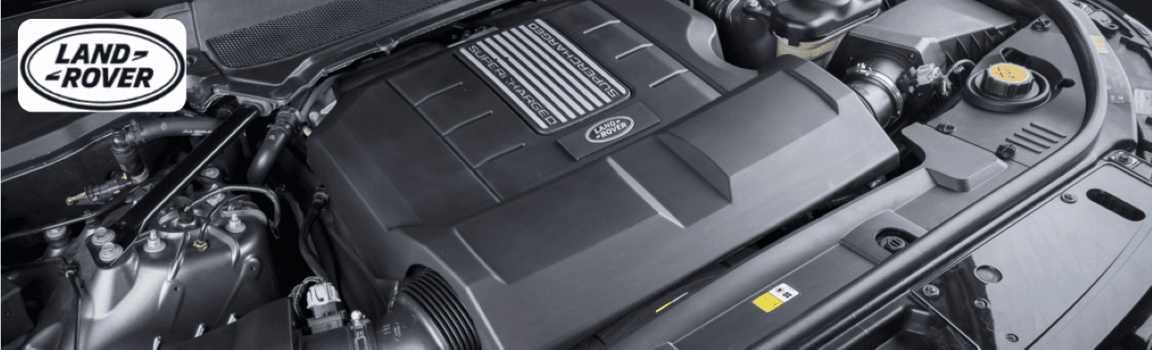 A certified technician performing an Audi oil change at Land Rover Dayton’s Columbus service center.