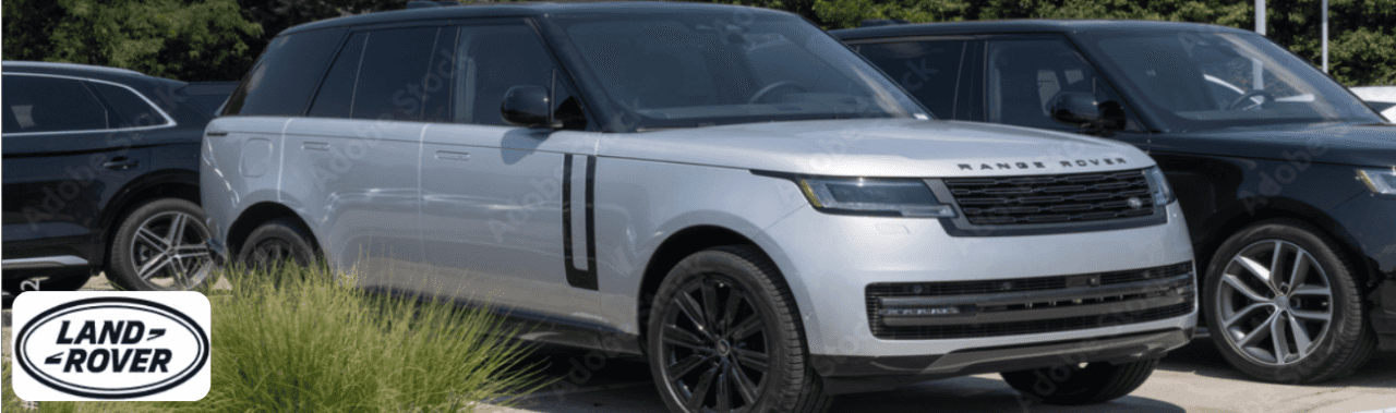 The Land Rover Range Rover Evoque Convertible driving through Dayton, OH, with the top down on a sunny day.
