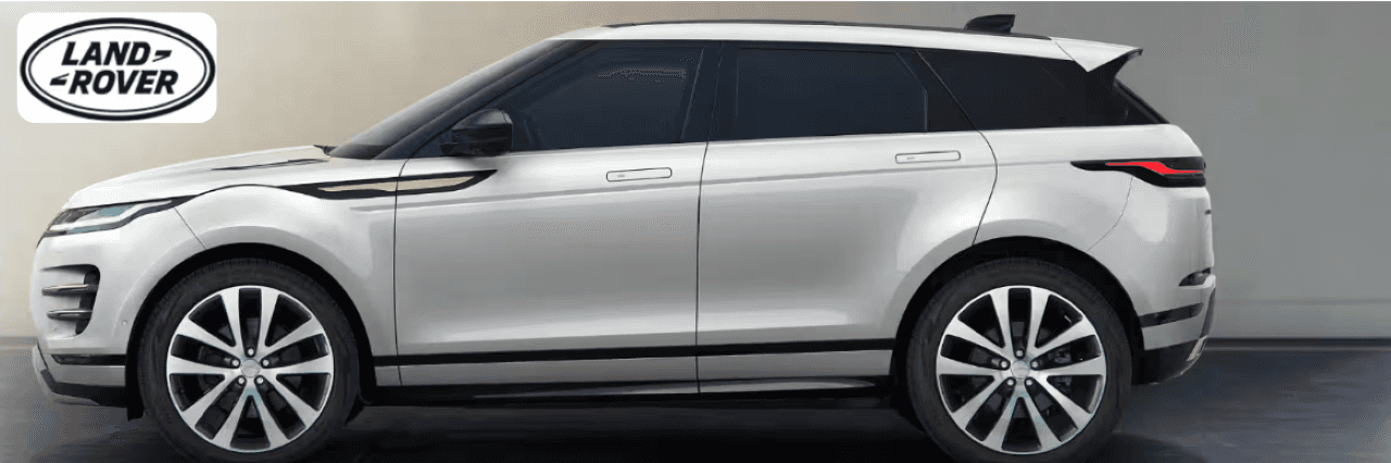 A Land Rover Evoque Convertible parked in front of the Land Rover Dayton dealership, top down, under the Ohio sun.