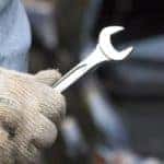 Mechanic Holding Wrench