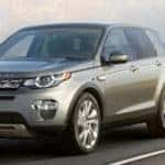 The 2019 Land Rover Discovery Sport driving down the street.