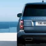 Blue 2019 Land Rover Range Rover PHEV overlooking ocean