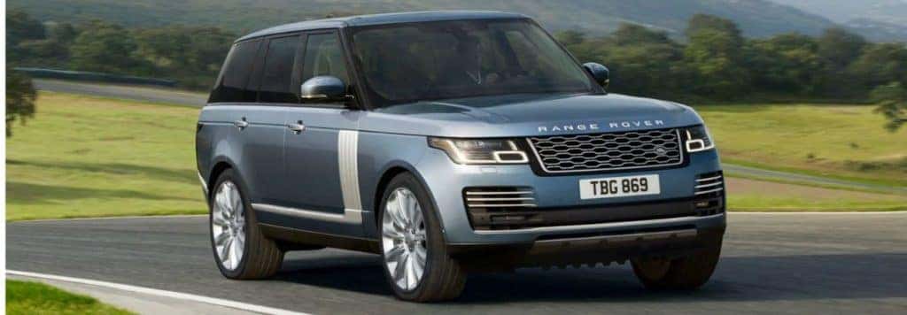 2020 range rover driving through the country side