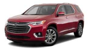 A red 2018 used Chevy Traverse is facing left.