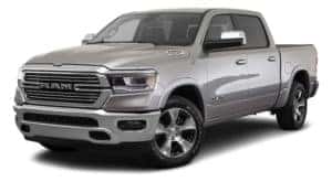 A silver 2019 used Ram 1500 is facing left.