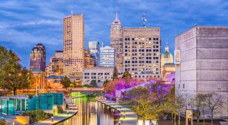 The skyline of Indianapolis is shown at sunset.