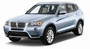 A light blue 2011 BMW X3 on white
