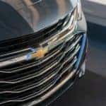 The front of a 2019 Chevy Malibu is featured.