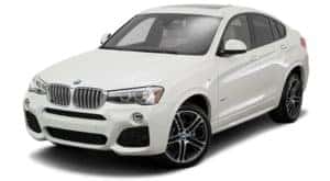 A white 2015 BMW X4 is facing left.