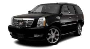 A black 2012 used Cadillac Escalade is facing left.