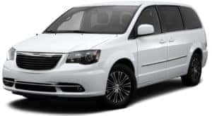 A white 2014 used Chrysler Town and Country is facing left.