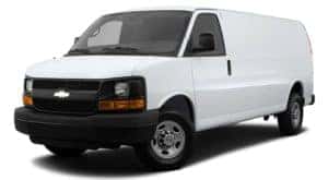 A white 2014 used Chevy Express 2500 is facing left.